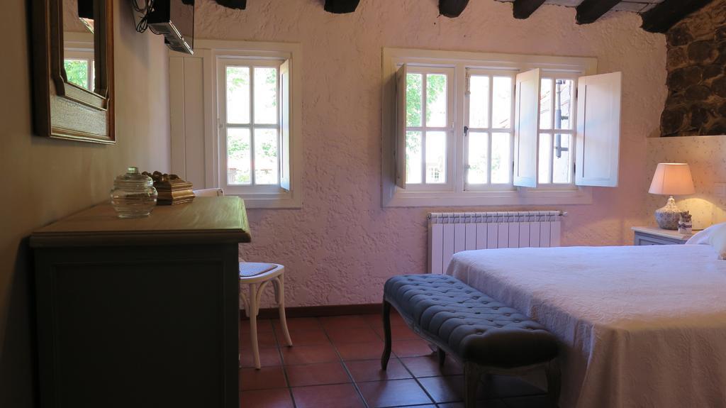 Posada Rural La Flor Del Nogal Ruente Habitación foto