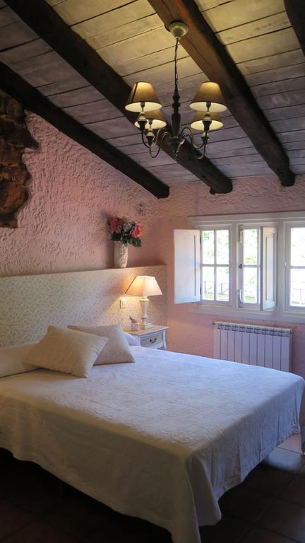 Posada Rural La Flor Del Nogal Ruente Habitación foto